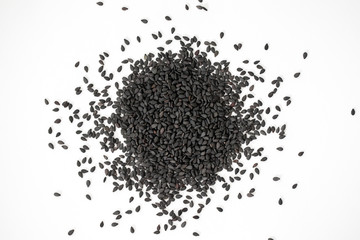 black sesame seeds on white background