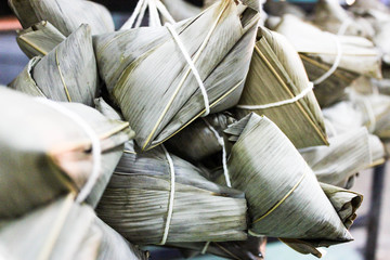 Fototapeta na wymiar Chinese tradition food - steamed rice dumpling, Zongzi or Traditional Chinese Sticky Rice Dumplings