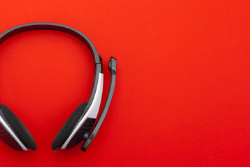 audio headset on color background