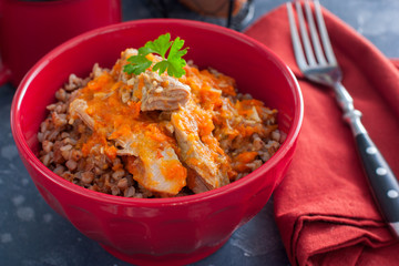 Buckwheat porridge with pork and carrots with bread, horizontal