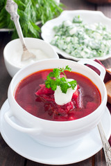 Ukrainian traditional borsch. Russian vegetarian red soup in white bowl . Top view. Borscht, borshch with beet