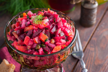 Vinaigrette (salad from boiled vegetables with beetroot), selective focus