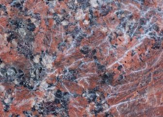 Granite texture with black and gray spots. Used as a background.