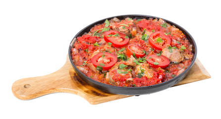 Stewed beef loin with tomatoes and onions.