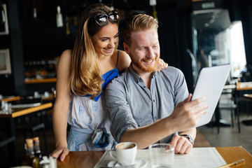 Woman and man flirting in cafe