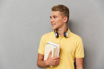 Portrait of a smiling teenage boy with headphones