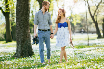 Fototapeta premium Romantic couple walking forest