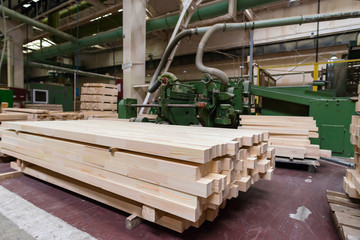 Stack of pile wood bar in lumber yard factory used in wood-proce
