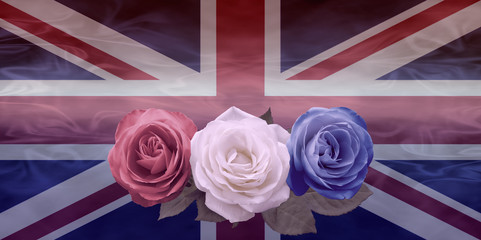 Very British Red White and Blue Roses - Vintage style Union Jack Flag background with a smokey effect and three roses in red white and blue in front providing copy space above 
