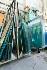 Glasses in industrial glass processing workshop 