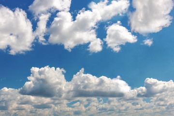 Cloudscape. Blue sky and white clouds.