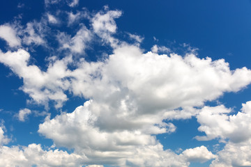 Naklejka na ściany i meble Cloudscape. Blue sky and white clouds.