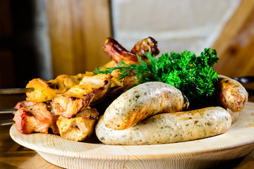Assorted delicious meat: tasty juicy shish kebab of pork and gri