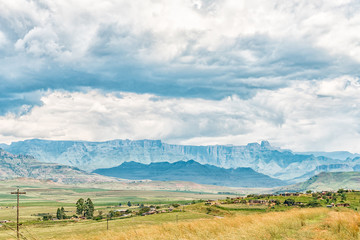 Township with the Amphitheatre in the Drakensberg in the back