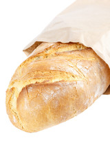 Loaf of wheat bread on white background.
