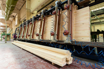 Glued pine timber beams in a woodworking factory