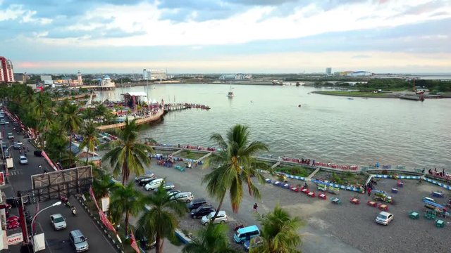 Indonesia - South Sulawesi - Makassar - Timelapse of Pantai Gapura during daytime.