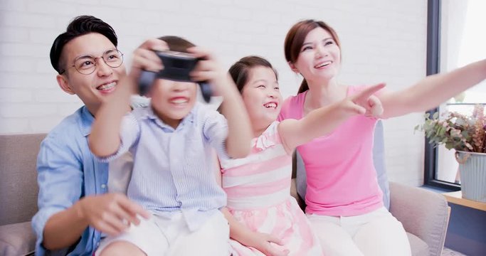 family play video game happily