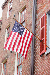 American flag on the brick wall background