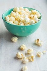 Green bowl with popcorn