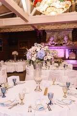 A wedding table for guests. Round banquet table