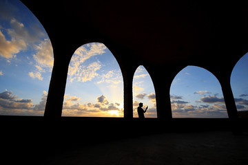 Silhouette of Man Taking Selfie