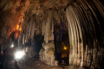 The Khao Bin Cave offers truly amazing scenes of plentiful stalactite and stalagmite formations in Thailand.