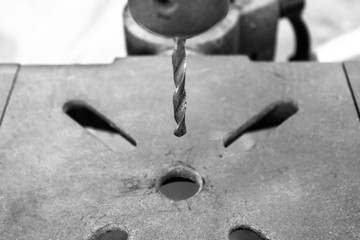 Selective focus of close up drill bits. Drilling.