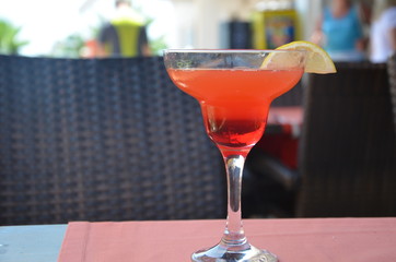 margarita cocktail in a glass on a background of bright lights.