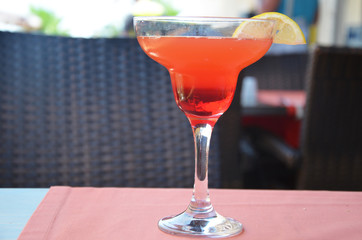 margarita cocktail in a glass on a background of bright lights.