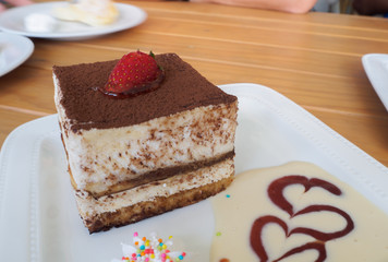Traditional italian dessert tiramisu with strawberry