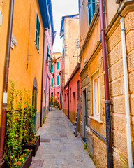 Colorful buildings in Monterosso in Cinque Terre, Italy on an overcast day.