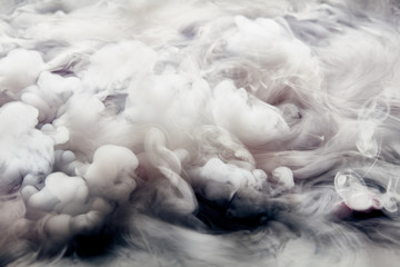 Abstract background of clouds made of smoke from dry ice in color pink