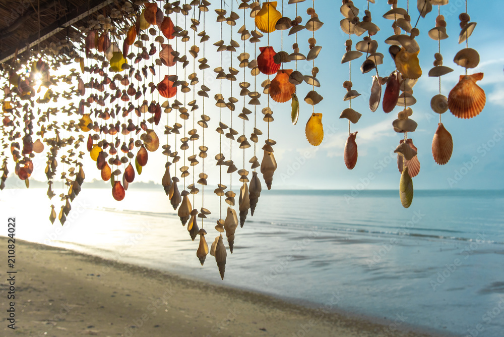 Poster Seashells hanging on strings for decoration