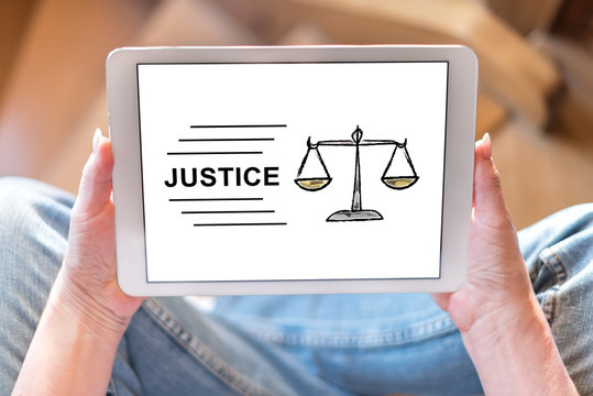 Justice concept on a tablet
