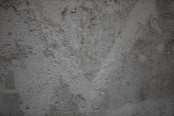 Gray spotted a concrete wall, background, texture
