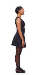 Side view of an African-American woman in a brown dress.
