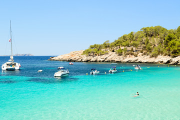 beach afternoon in Cala Salada, Sant Antoni de Portmany Ibiza, Spain - obrazy, fototapety, plakaty