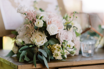Decoration of a wedding with greens and flowers.