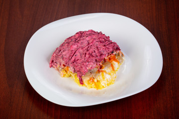 Russian salad with herring and beetroot