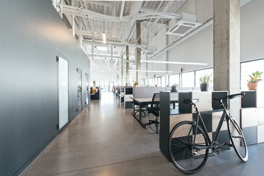 Contemporary office interior with bicycle