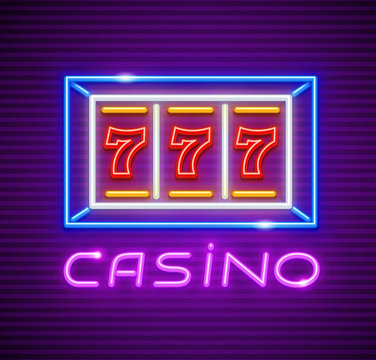 Casino playing slot-machine with jackpot 777 winning at screen.