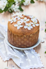  traditional italian pannetone cake decorated with flowers of apple tree