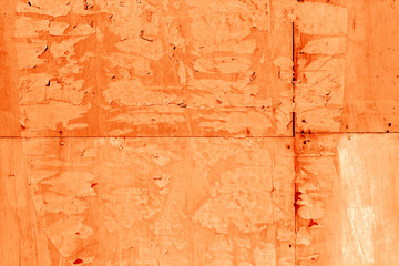 Wood shields wall texture in orange tone.