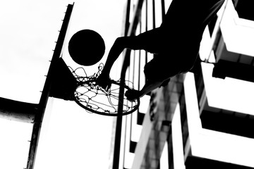 abstract upside down dunk basketball black and white background