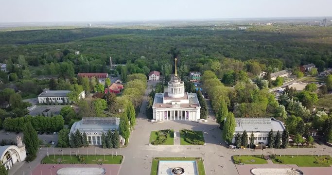 Panoramic video from the drone above the central square and recreational areas of the National Exhibition Center in Kiev, Ukraine. Slow motion view from drone in 4K video