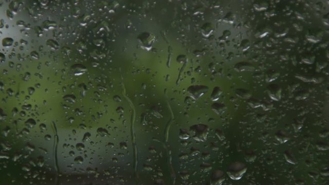 Rain drops on the window during the storm - accelerated video