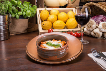 Fried pasta with cherry tomatoes and buffalo mozzarella