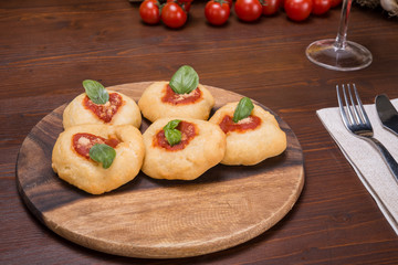 Fried pizza on italian table