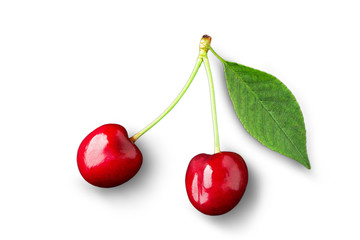 Cherries with leaf closeup isolated on white background. Cherry